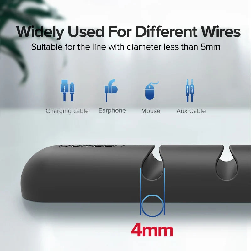Organizador de cables de silicona con adhesivo para escritorio, veladores, y muebles en general.