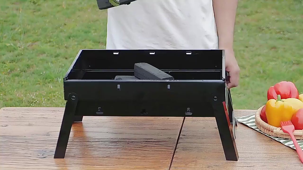 Video de la parrilla portátil plegable a carbón